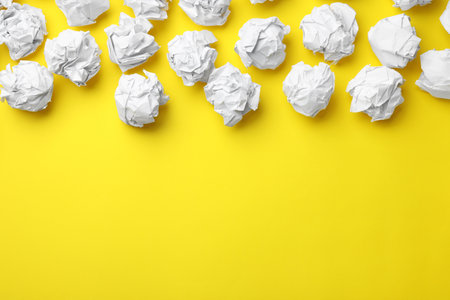 Paper balls on color background, flat lay. Space for textの写真素材