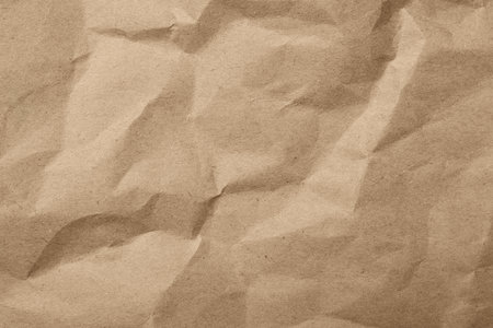 Brown crumpled paper texture as background, top viewの写真素材