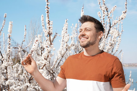 Happy healthy man enjoying springtime outdoors. Allergy free conceptの写真素材