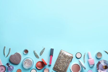 Flat lay composition with stylish female accessories and decorative cosmetics on color background, space for textの写真素材