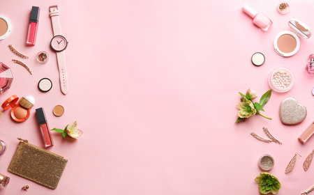 Flat lay composition with stylish female accessories and decorative cosmetics on color background, space for textの写真素材