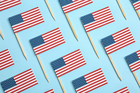 Flat lay composition of USA flags on color background. Happy Independence Dayの写真素材
