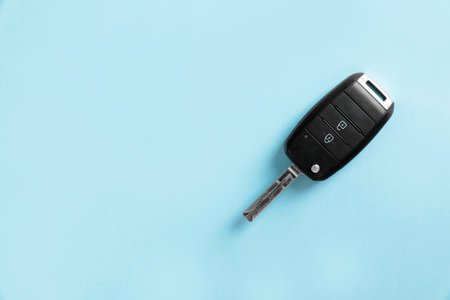 Car key on color background, top view with space for textの写真素材
