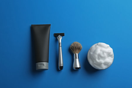 Flat lay composition with men's cosmetic products on color background. space for designの写真素材