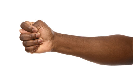 African-American man showing fig gesture on white background, closeupの写真素材
