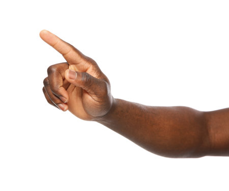 African-American man pointing at something on white background, closeupの写真素材