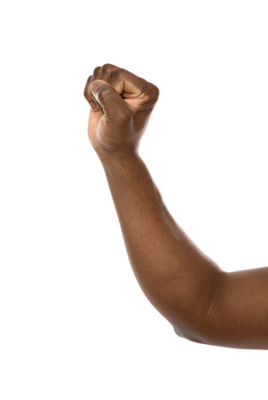 African-American man showing fist on white background, closeupの写真素材