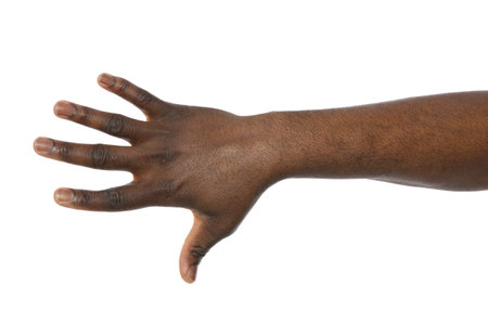African-American man showing hand gesture on white background, closeupの写真素材