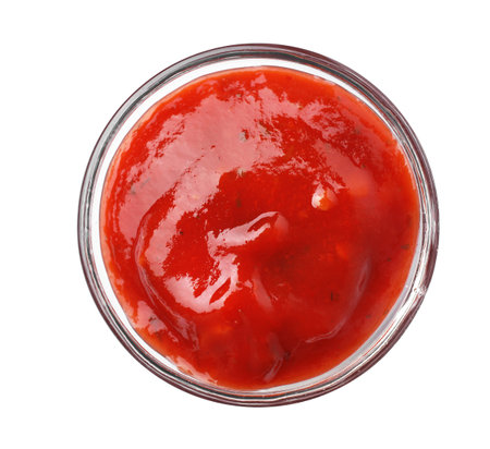 Bowl with red sauce isolated on white, top viewの写真素材