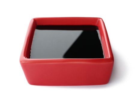 Dish of soy sauce on white backgroundの写真素材