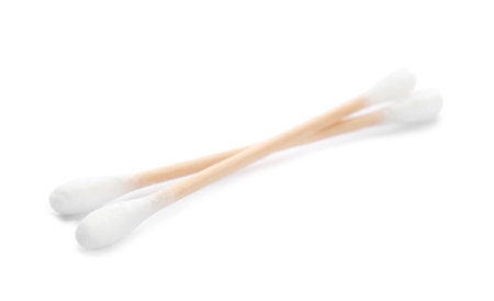 Wooden cotton swabs on white background. hygiene accessoryの写真素材