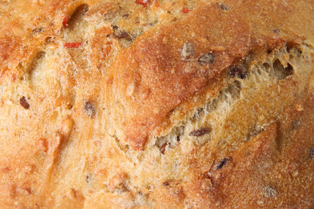 Tasty white bread with seeds as background, closeup