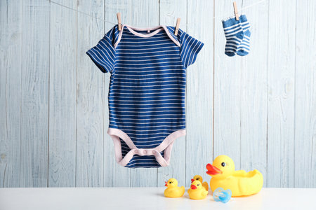 Composition with baby accessories on wooden backgroundの写真素材
