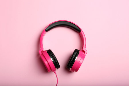 Stylish headphones on color background, top viewの写真素材