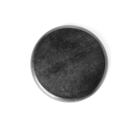 Black spa stone on white background, top viewの写真素材