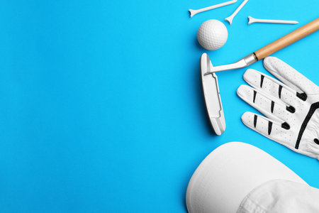 Set of golf equipment on color background, flat lay. Space for textの写真素材