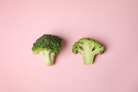 Fresh green broccoli on color background, flat layの写真素材