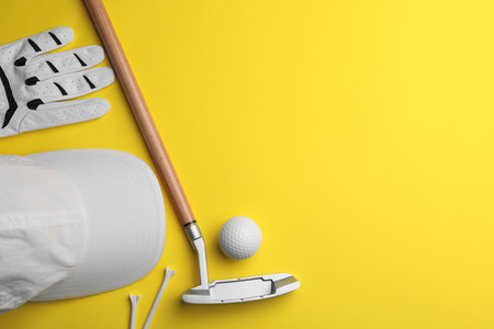 Set of golf equipment on color background, flat lay. Space for textの写真素材