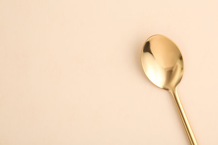Clean tea spoon and space for text on color background, top viewの写真素材
