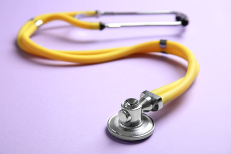 Stethoscope with space for text on color background, closeup. medical toolの写真素材