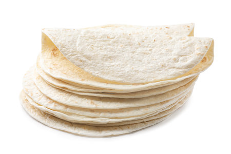 Stack of corn tortillas on white background. Unleavened breadの素材 [FY310208295542]