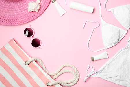 Flat lay composition with stylish bikini on color background. Space for textの写真素材