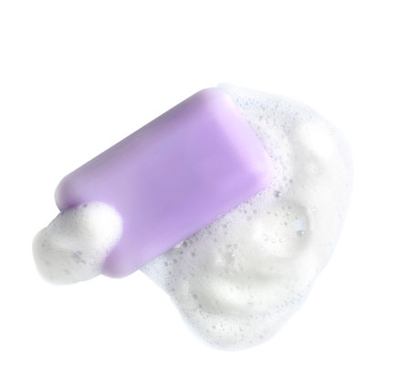 Soap bar and foam on white backgroundの写真素材