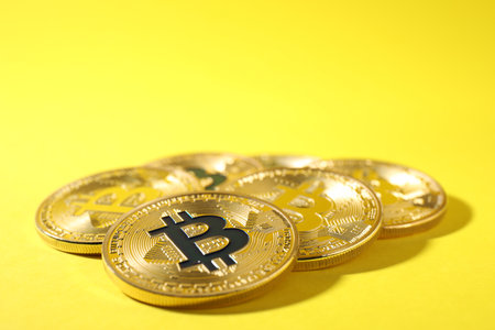 Bitcoins on color background, space for text. digital currencyの写真素材