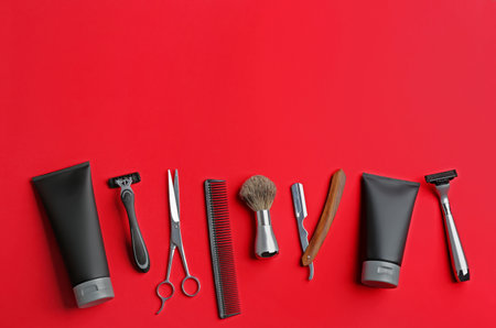 Set of barber's equipment and men's cosmetic products on color background, flat lay. Space for textの写真素材