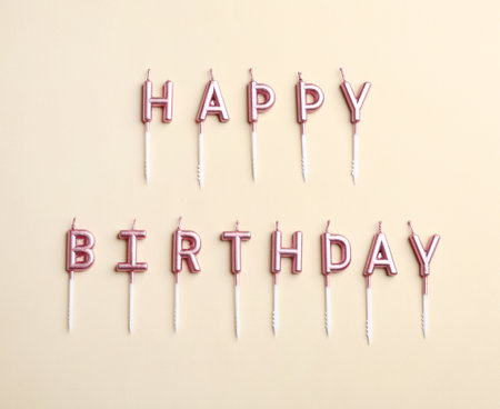 Flat lay composition with birthday candles on color backgroundの写真素材