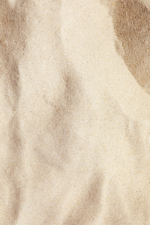 Sandy beach on sunny day, above viewの写真素材