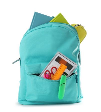 Bright backpack with school stationery isolated on white