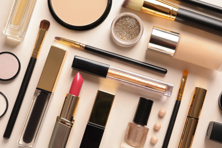 Different luxury makeup products on color background, flat layの写真素材