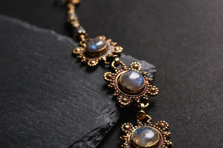 Elegant bracelet on black background, closeup. luxury jewelry