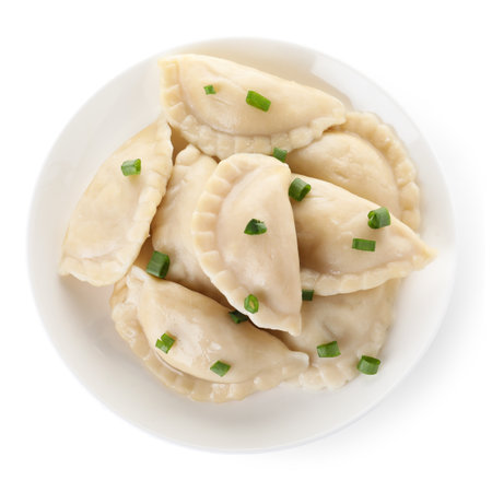 Plate of tasty cooked dumplings isolated on white, top viewの写真素材