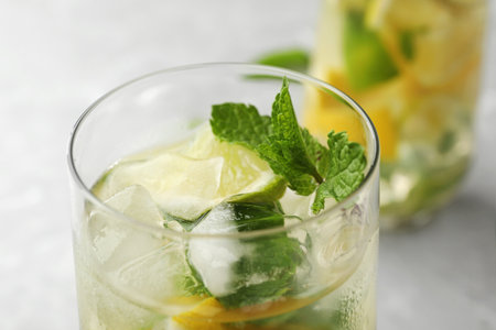Glass of refreshing lemonade with mint on table, closeup. summer drinkの写真素材