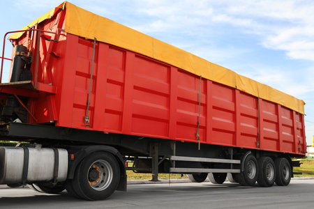 Modern bright truck parked on country roadの写真素材