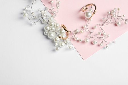 Elegant jewelry on color background, above view with space for textの写真素材