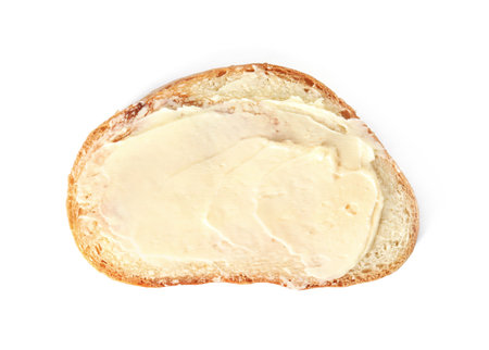 Slice of bread with butter isolated on white, top viewの写真素材