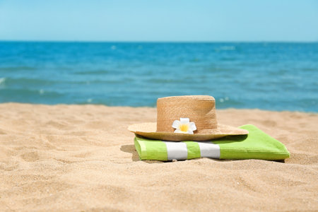 Different beach objects on sand near sea. Space for textの写真素材
