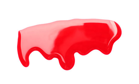 Colorful nail polish spilled on white backgroundの写真素材