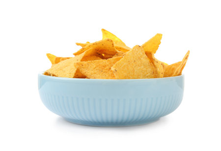 Ceramic bowl of Mexican nachos chips on white backgroundの写真素材