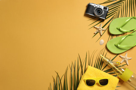 Flat lay composition with beach accessories on color background. Space for textの写真素材