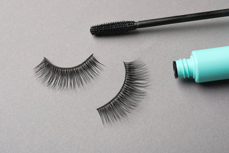 False eyelashes and mascara on gray backgroundの写真素材