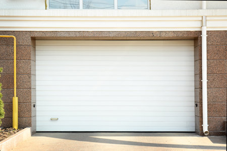 Closed roller shutter door of modern garageの写真素材