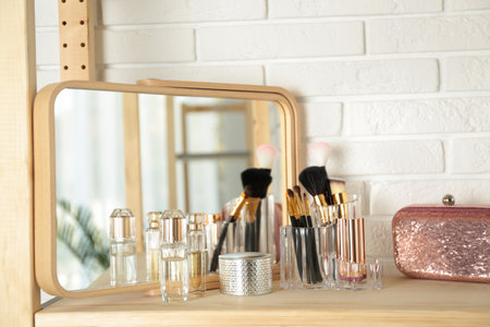 Perfumes and makeup products on dressing tableの写真素材