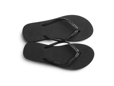 Pair of stylish flip flops on white background, top viewの写真素材