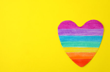 Top view of rainbow heart on color background, space for text. gay symbolの写真素材