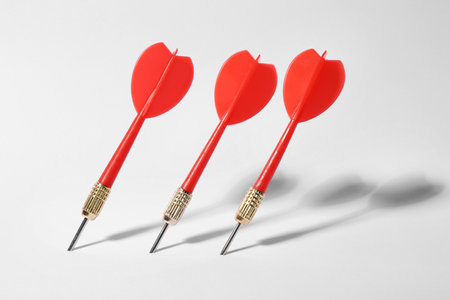 Red dart arrows for game on white backgroundの写真素材