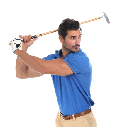 Young man playing golf on white backgroundの写真素材